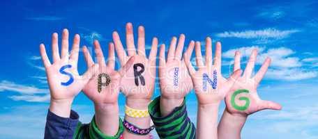 Children Hands Building Word Spring, Blue Sky