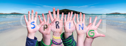 Children Hands Building Word Spring, Ocean Background
