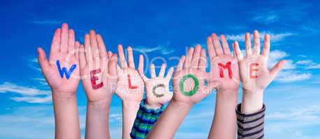 Many Different Children Hands Building Word Welcome, Deep Blue Sky