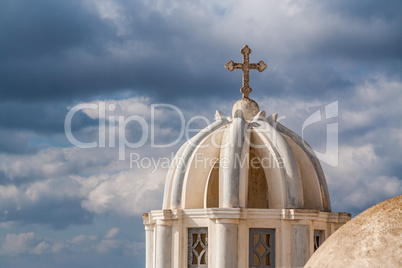 Scenic Christian Church Dome and Crucifix with Cloudy Background