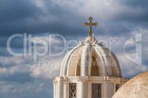Scenic Christian Church Dome and Crucifix with Cloudy Background
