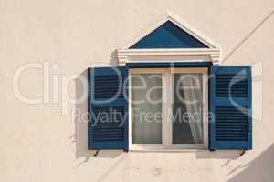Abstract of Home Wall and Window with Shutters on the Island of