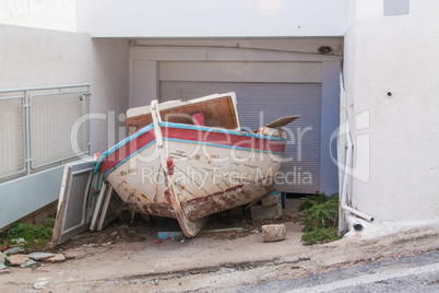 Rundown Boat In Storage At Home in Santorini Greece
