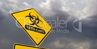 Bio-hazard Symbol With SARS-CoV-2 Coronaravirus Yellow Road Sign