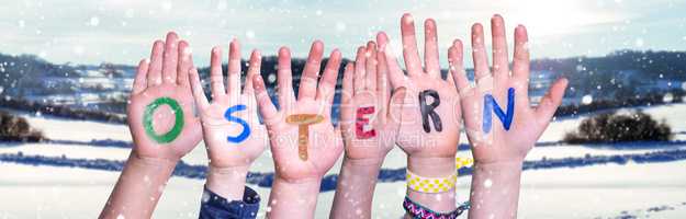 Children Hands Building Word Ostern Means Easter, Winter Scenery