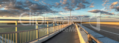 Bench view of a Golden sunset the SS Jolley Bridge into Marco Is