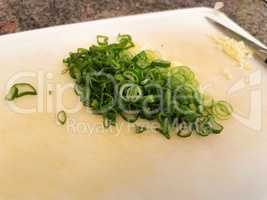 Finely chopped green onion cooked for lettuce