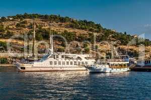 Pleasure boat parking near Kusadasi Castle in Turkey