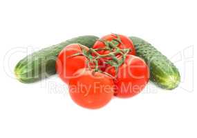 Sprig of ripe tomatoes and cucumbers