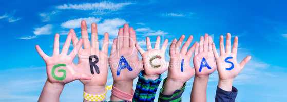 Children Hands Building Word Gracias Means Thank You, Blue Sky