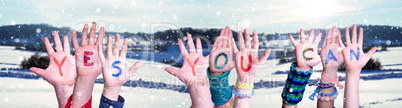 Children Hands Building Word Yes You Can, Snowy Winter Background