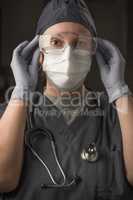Female Doctor or Nurse Wearing Scrubs, Protective Face Mask and
