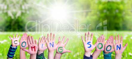 Children Hands Building Word Coming Soon, Grass Meadow