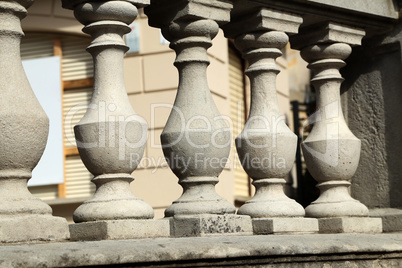 Balustrade of stone columns lit by the sun