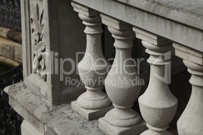 Balustrade of stone columns lit by the sun