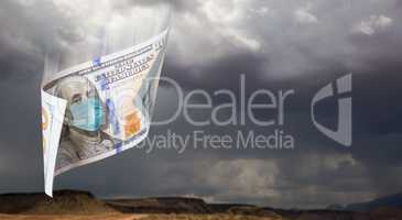 100 Dollar Bill with Medical Face Mask Falling From Stormy Cloud