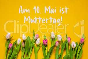 Colorful Tulip, Text Muttertag Means Mothers Day, Yellow Background