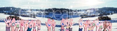 Children Hands Building Word Together We Are Stronger, Snowy Winter Background