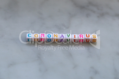 Coronavirus. The word is made of small cubes