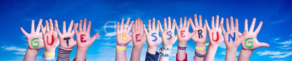 Children Hands Building Word Gute Besserung Means Get Well Soon, Blue Sky