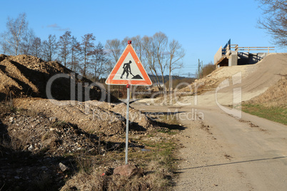 Road sign pending reconstruction of a road bridge