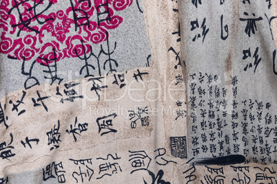 Pink and black Asian text fabric print