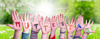 Children Hands Building Word Muttertag Means Mother Day, Grass Meadow