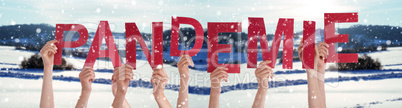 People Hands Holding Word Pandemie Means Pandemic, Snowy Winter Background