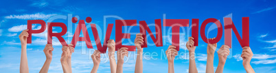People Hands Holding Word Praevention Means Prevention, Blue Sky