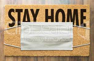 Welcome Mat With Medical Face Mask and Stay Home Text Amidst The