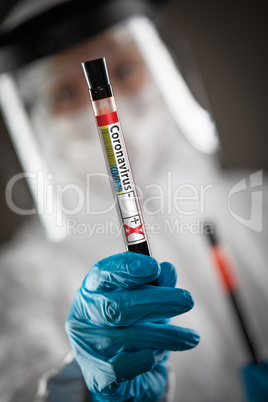 Female Doctor or Nurse Holding Test Tube of Blood Labeled Positi