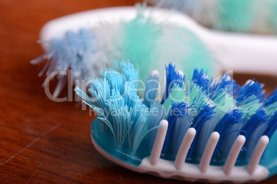 xtreme Macro close up of toothbrush with wooden background