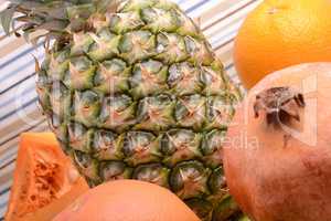 collection of fruit and vegetables. Pineapple, lemon, grapefruit, onion, pumpkin