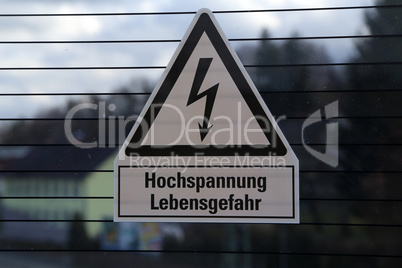 Sign warns of danger - high voltage danger to life