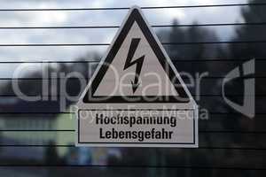 Sign warns of danger - high voltage danger to life