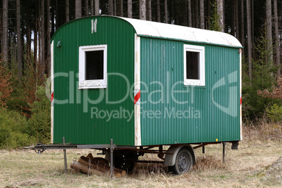 Mobile logger hut stands in the forest