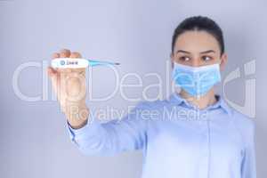 Girl with mask on face check fever