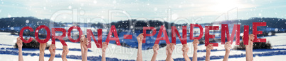 Hands Holding Word Pandemie Means Corona Pandemic, Snowy Winter Background
