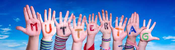 Children Hands Building Word Muttertag Means Mother Day, Blue Sky