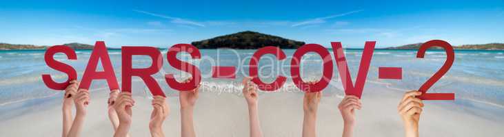 People Hands Holding Word Sars-Cov-2, Ocean Background