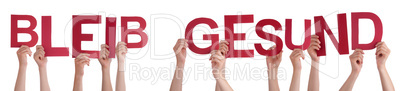 People Hands Holding Word Bleib Gesund Means Stay Healthy, Isolated Background