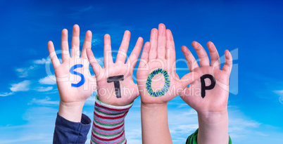 Children Hands Building Word Stop, Blue Sky
