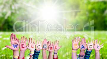 Children Hands Building Word Welcome Back, Grass Meadow