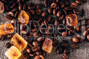 Roasted coffee beans and crystalline sugar