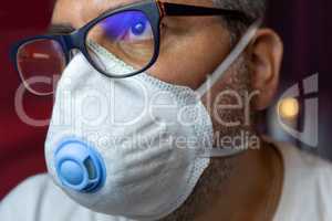Man with medical mask and glasses