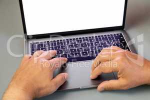 Typing on a laptop keyboard, white screen - copy space