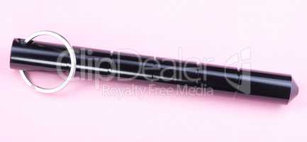 Self Defense Aluminum Alloy Stick on Pink Background