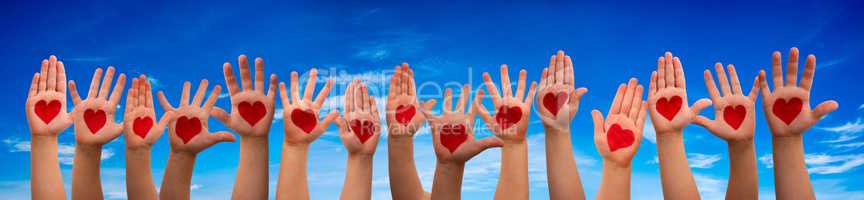 Children Hands With Heart Symbol, Blue Sky Background