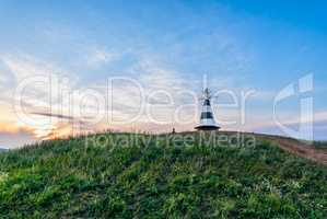 Beacon with the pointer on the hill