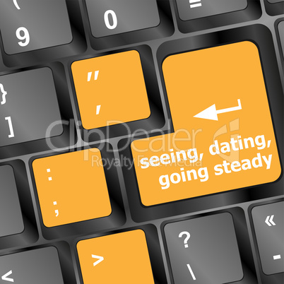 Modern keyboard with seeing, dating, going, steady text symbols